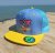 Snap Trucker Yellow-Light Blue kšiltovka BejkRoll - Triangl logo