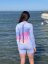 Ladies wetsuit BejkRoll Pastel Rainbow - girl in water back - size M
