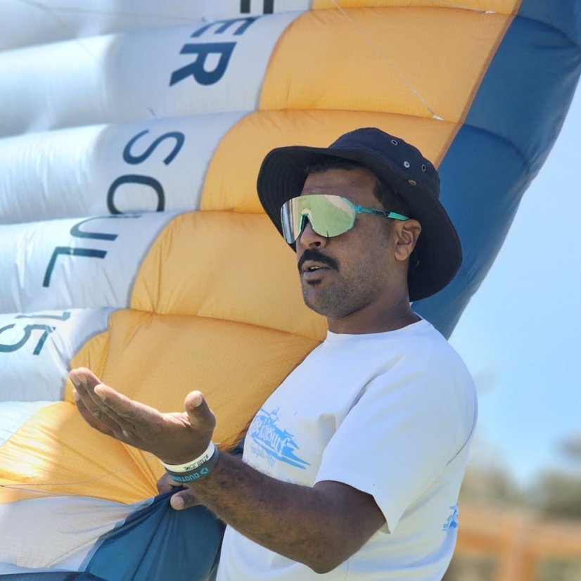 Sunglasses BejkRoll Champion REVO + EVA Box - rimless transparent light green - silver mirror - beachboy is holding the kite