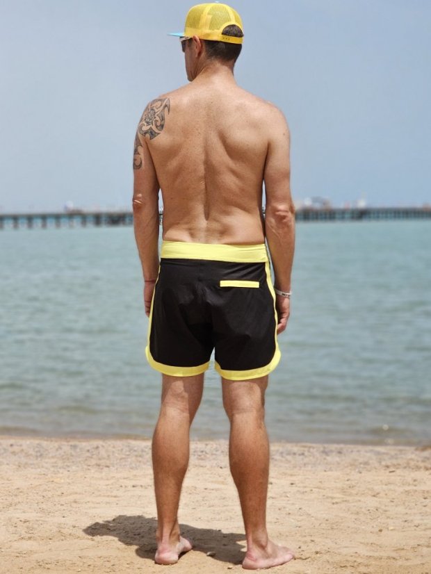 Board Shorts BejkRoll - OUTLINE 3/4 - yellow black - unisex - boy on the beach - back
