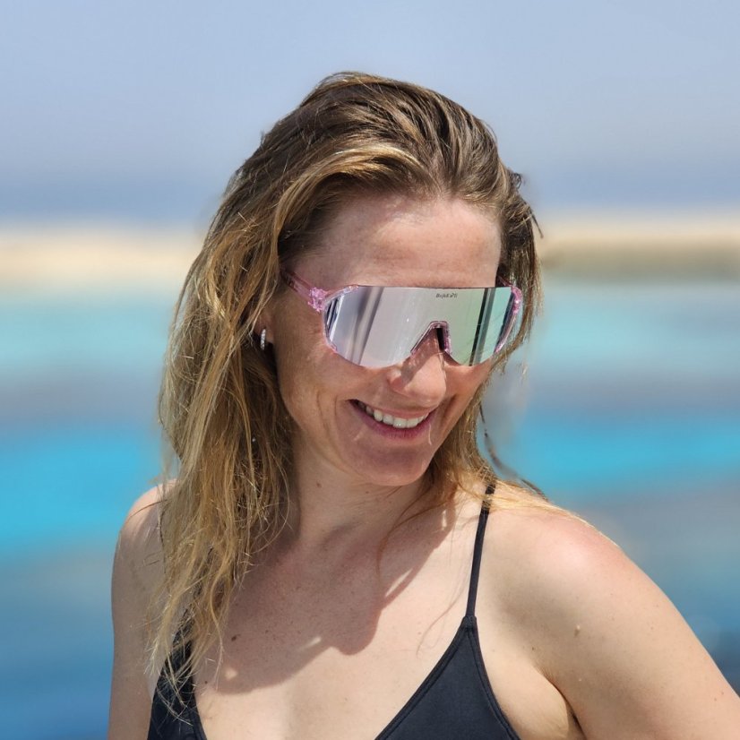 Sunglasses BejkRoll Champion REVO + EVA Box - rimless transparent light purple - purple mirror - girl on the boat