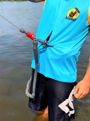 Sports functional kiteboarding Tank Top BejkRoll turquise yellow - in water with bar detail