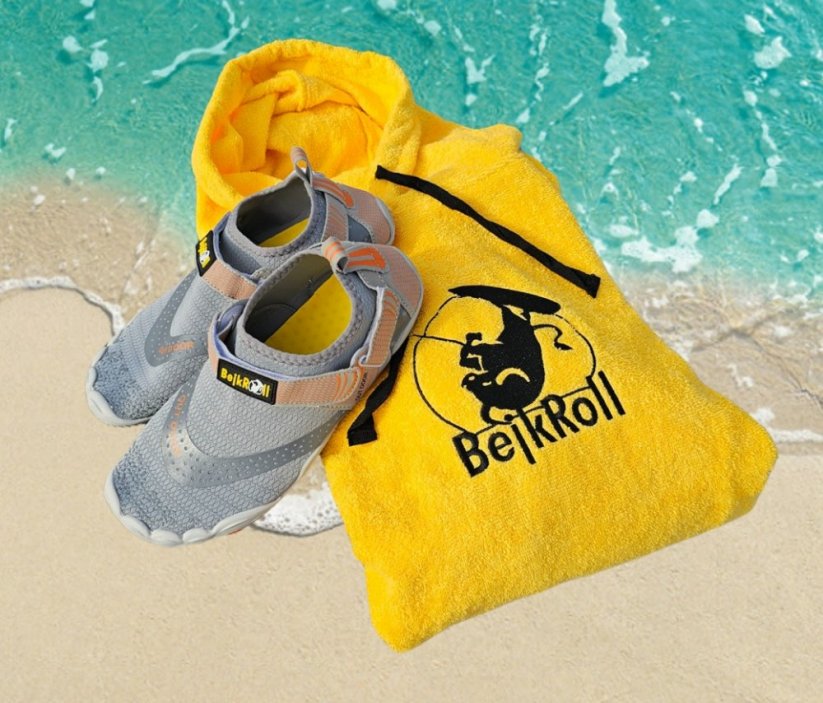 Surf Poncho BejkRoll yellow on beach and water shoes - grey