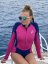Ladies wetsuit BejkRoll Pink Lagoon sitting with sunglass - size S