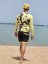 Board Shorts BejkRoll - OUTLINE 3/4 - yellow black & yellow rashguard - unisex - on the beach - back