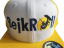 Snap Trucker Amarillo/Blanco - Logo recto