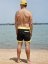 Board Shorts BejkRoll - OUTLINE 3/4 - yellow black - unisex - boy on the beach - back
