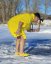 Surf Poncho BejkRoll WAVE MASTER - yellow - boy cutting a hole in the ice - side