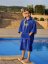 Surf Poncho BejkRoll WAVE MASTER - royal blue - man standing by the pool - size XL