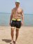 Board Shorts BejkRoll - OUTLINE 3/4 - yellow black - unisex - boy on the beach - front